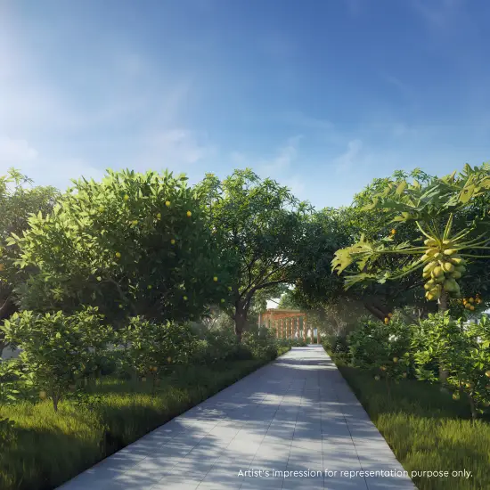Walkway surrounded by lush greenery and landscaped trees at Godrej Verdania Estate Indore.